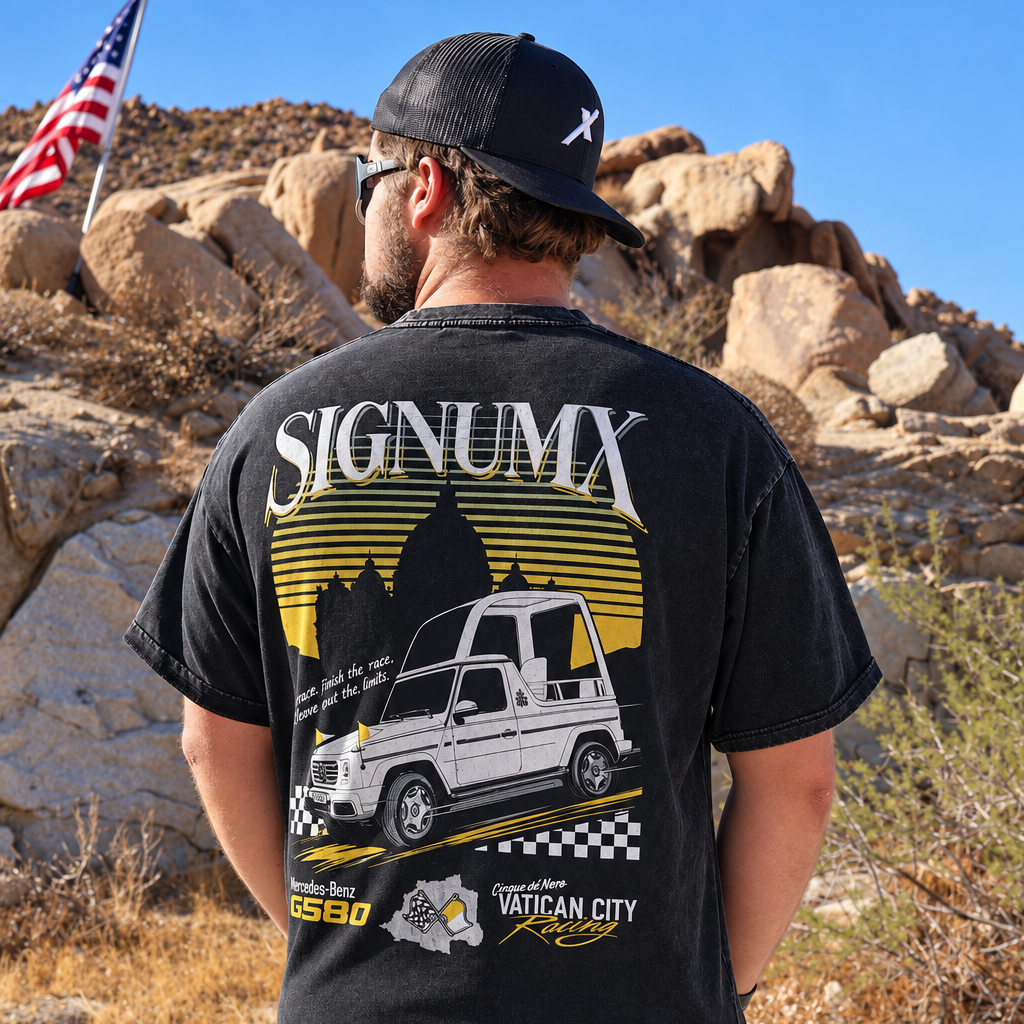 Man wearing washed black Vatican City Racing Catholic shirt, back racing graphic. Model is 5'10" and wearing a Large