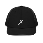 SIGNUMX Cross trucker hat, black – front, embroidered white X (Sign of the Cross)