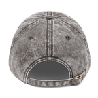 Women's SIGNUMX dad hat in charcoal grey vintage wash, back view with brass buckle strap