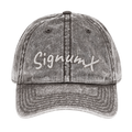 Women's SIGNUMX dad hat in charcoal grey vintage wash, front with white embroidered SignumX script