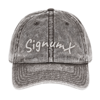 Women's SIGNUMX dad hat in charcoal grey vintage wash, front with white embroidered SignumX script